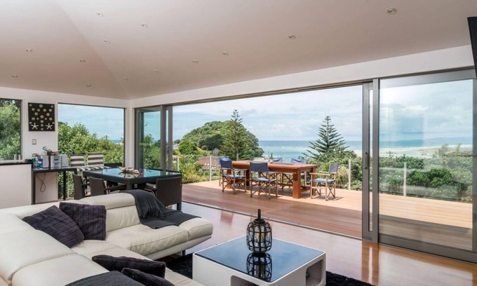 Mangawhai Heads House | Spits End - Large, modern holiday home with stunning views a short walk to estuary surf beach