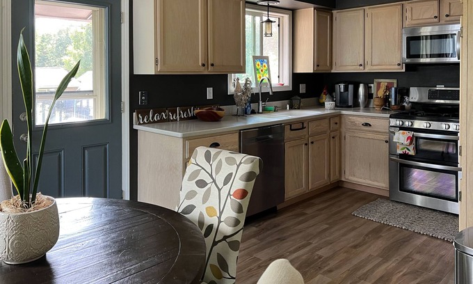 Taku - Campbell House | Splendid home with gas grill, deck, wood-burning fireplace, kitchen, & crib