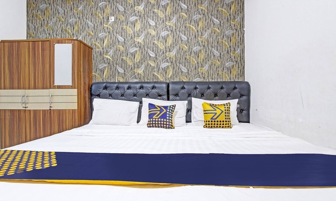 Muncar Hotel | SPOT ON 91521 Mayong Guesthouse