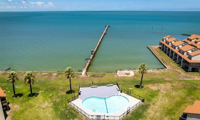 Harbor Oaks House | Starfish Cove- Amazing Bayfront Condo! Short Term and Long-Term Rentals