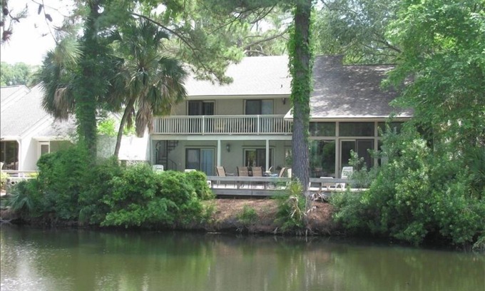 Sea Pines House | Stay in the heart of Harbor Town on a lagoon between the 16th Green and 17 tee