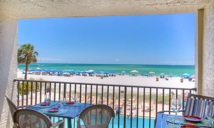 Madeira Beach Condo | Stay On The Beach and Directly Across From Johns Pass Village. Beautifully Furnished!