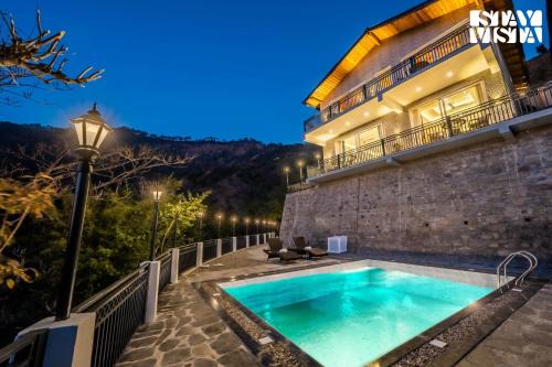 Naina Range Villa | StayVista at Sunset Springs with Pool & Views