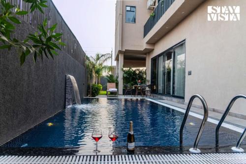 Jaipur Villa | StayVista at Urban Escape - 2 Pools, Lawn & WiFi