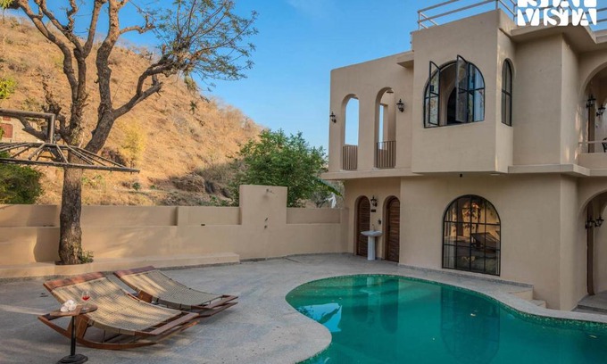 Bedla Villa | StayVista at Vanya Veda with Bathtub, Pool & Lawn