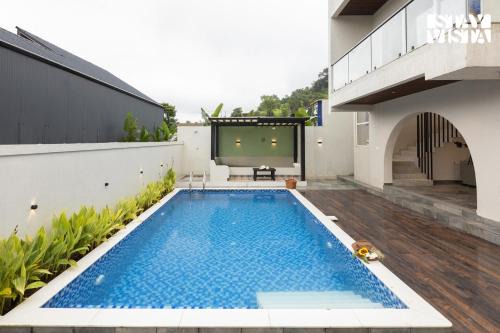 Khodala Villa | StayVista at Zenith Palms with Bonfire, Jacuzzi