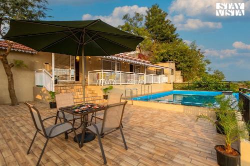 Nashik Villa | StayVista's Harvest Haven - Pool-View Villa with Deck & Machan near Sula