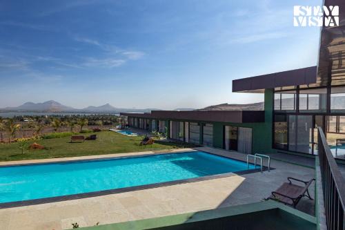 Dindori Villa | StayVista's Minty Mirage - Mountain & Lake-View Villa with Pool, Expansive Lawn & Terrace