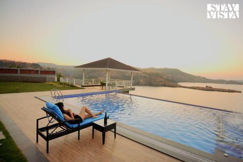 Igatpuri Villa | StayVista's The Aquamarine Villa - Igatpuri - Lakeside Retreat with Infinity Pool & Deck, Theatre Room & Gazebo