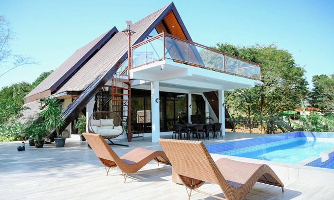 Bolinao Cabin | Step into an A-Frame home, where white tropical design meets ultimate comfort.