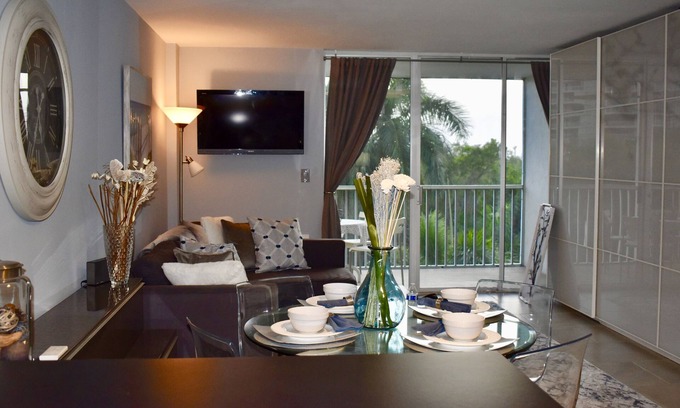 Vanderbilt Beach Apartment | Steps from bluebill beach with stunning sunsets from your balcony.
