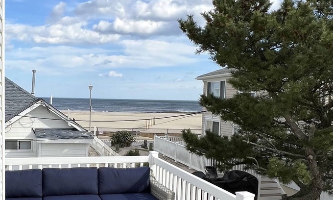 Point Pleasant Beach House | Steps from beach/boardwalk! Ocean views and hot tub! Parking Included!