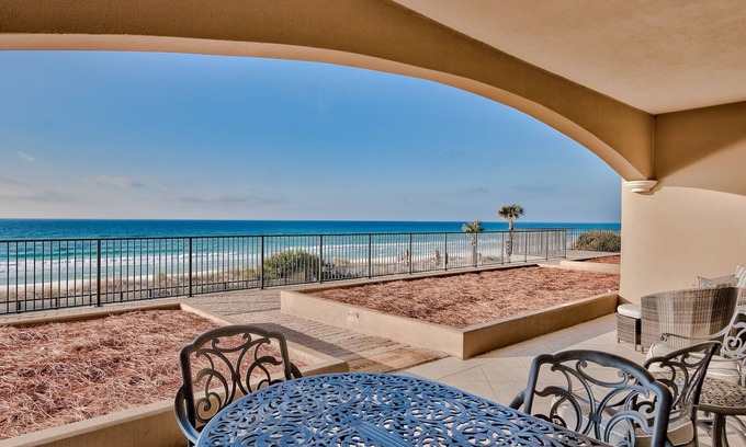 Crystal Beach Condo | Steps to the Gulf and private beach, heated pool, gym; walk to food and fun!