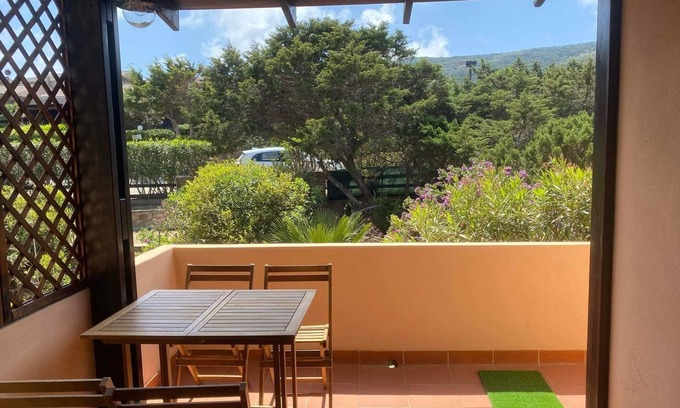 La Pelosa Apartment | Stintino: house with sea view, garden, Wi-Fi, air conditioning and mosquito nets
