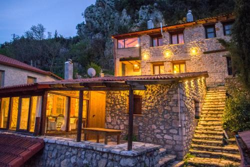 Lilaia Ski Chalet | Stone house on the rock