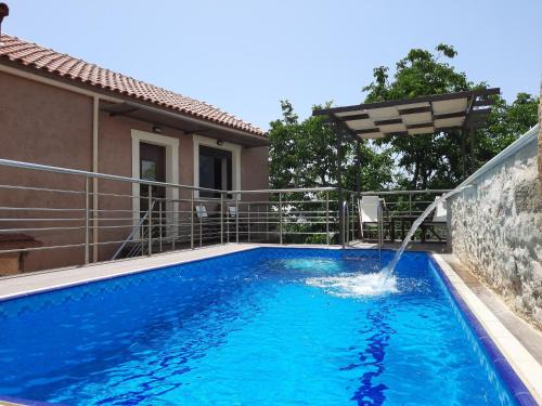 Kaina House | Stone Mansion