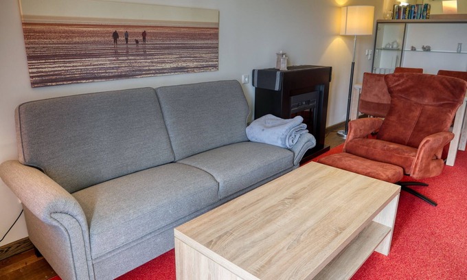 Wremen Apartment | Strandnahe Ferienwohnung mit Sauna & Schönem, Überdachten Balkon mit Deichblick