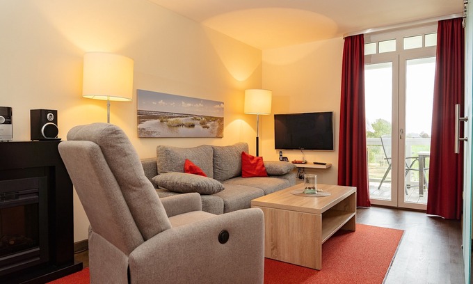 Wremen Apartment | Strandnahe, Hübsche Wohnung mit Sauna und Balkon mit Blick zum Nordseedeich