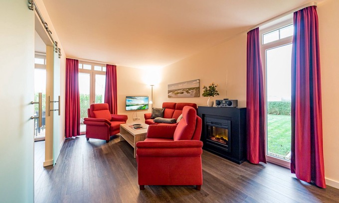 Wremen Apartment | Strandnahe, Schöne Wohnung mit Sauna, Terrasse mit Strandkorb und Landblick
