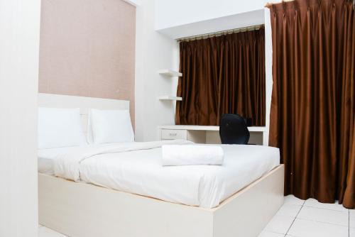 Depok Apartment | Strategic and Comfy Studio Apartment at Margonda Residence 5 By Travelio