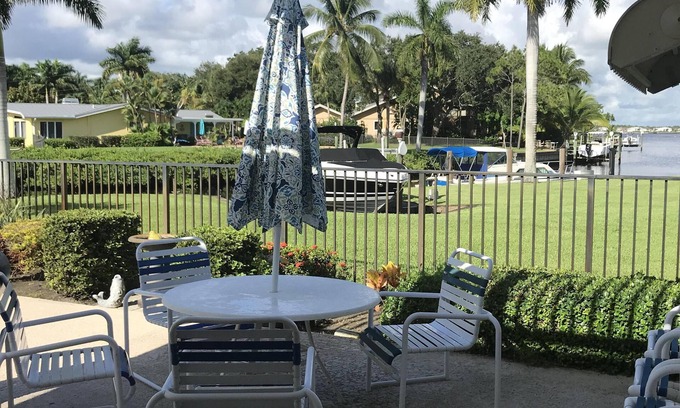 North River Shores House | Stuart Waterfront Tropical Paradise heated pool. Close to beaches and downtown.
