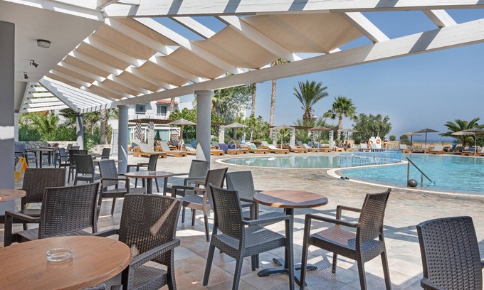 Kardamena Apartment | Studio Apartment 'Evripides Triple Room 1' with Shared Pool, Shared Garden and Air Conditioning