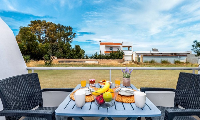 Ixia Apartment | Studio Apartment 'Sea Front In Ixia' with Private Garden, Wi-Fi and Air Conditioning