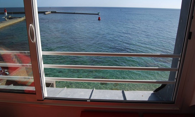 Guilvinec Apartment | Studio in house bordering the water, exceptional view over the harbour entrance