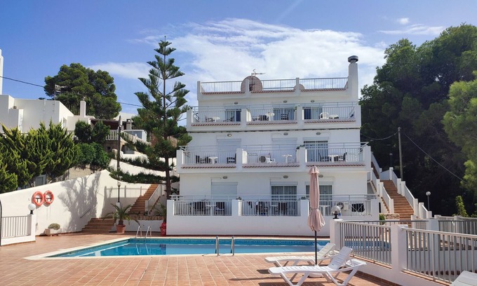 Portinatx Apartment | Studio next to the beach with pool view