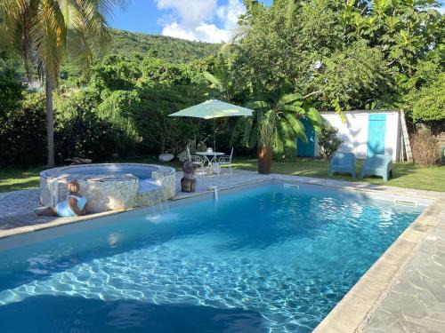 Case-Pilote Apartment | Studio Piscine Privée - 1 min à pied de la plage