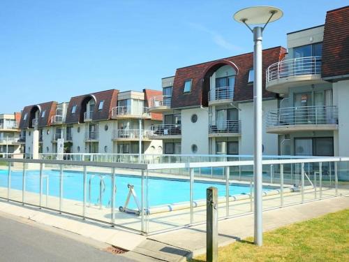 Bredene Apartment | Studio voor 4 personen met zwembad aan zee