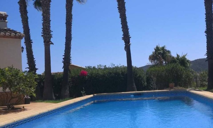 Ador Apartment | Studio with stunning views of sea and mountains with private pool and garden