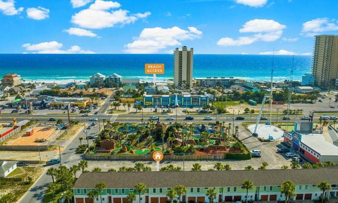 Bel Air House | Stunning Beachside Townhouse with Pool, 2 Car Garage, and Lagoon Access