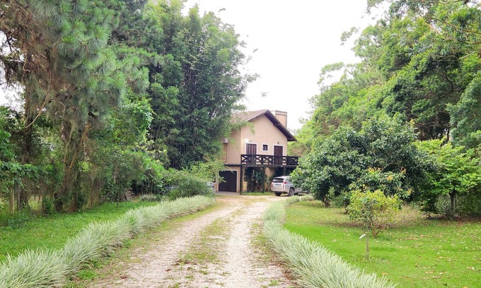 Imbituba House | Stunning house on the edge of the lake.