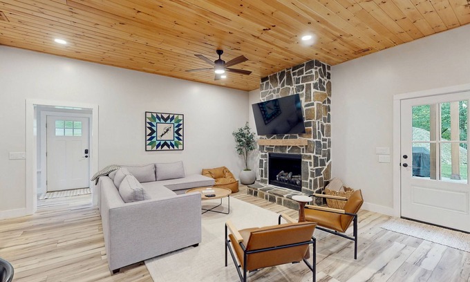 Foscoe Cottage | Stunning dog-friendly cottage with riverfront patio, hot tub, fire pit, & views