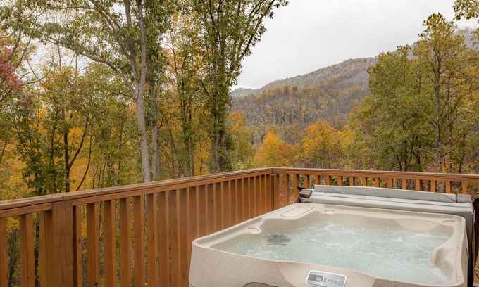 Gatlinburg - Pigeon Forge Cabin | Stunning Gatlinburg Mountain Views with a Hot Tub, Billiards + Seasonal Pool Acc