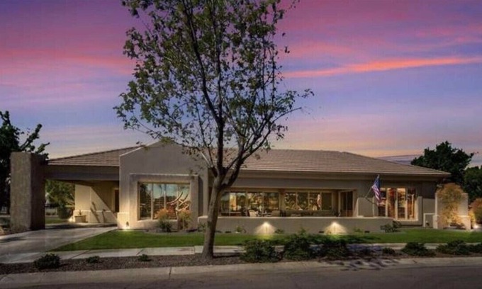 Val Vista Lakes House | Stunning lake view home with oversized jetted spa