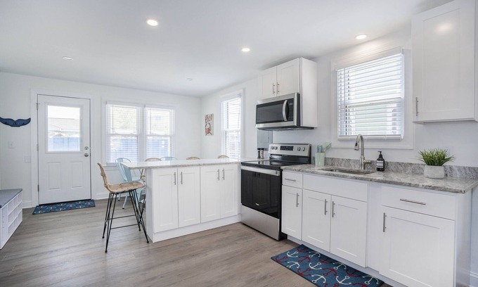 Rehoboth by the Sea Condo | Stunning Renovated Ground Level Condo in Dewey Beach Sleeps 8