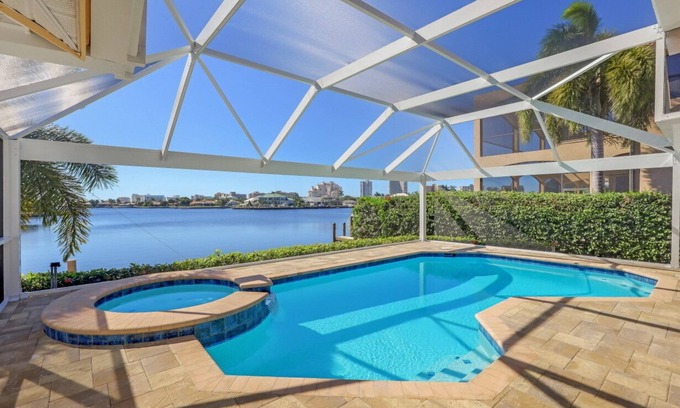 Marco Island House | Stunning Southern Exposure Landmark Bay Home w/heated pool, spa, & dock