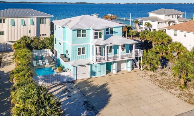 Villa Primera House | Stunning Waterfront Home w/Private Pool and beautiful NEW Tiki Bar!