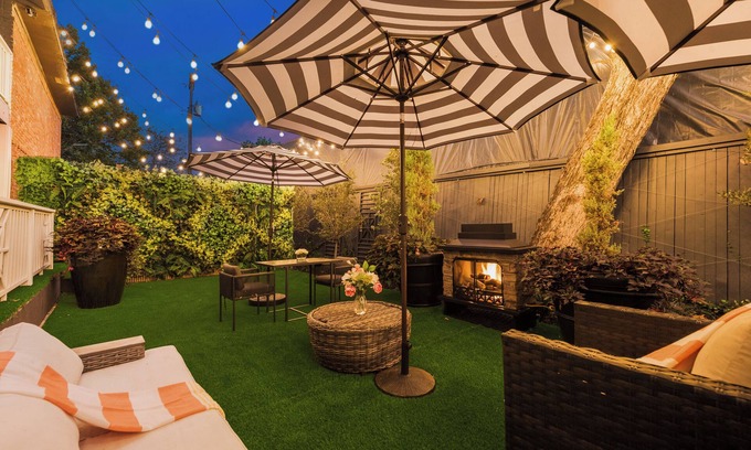 Peak's Suburban Addition Condo | Stylish 1BR furnished condo in Central Dallas with high-end kitchen, Nespresso coffee, 65” smart TV, king bed with premium mattress, and award-winning courtyard retreat.