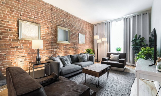 Latin Quarter Apartment | Stylish 4BDR Downtown Montreal Home - Brick Walls & Cozy Vibes