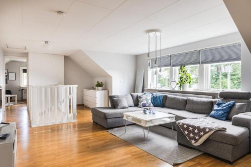 Sibbhult Villa | Stylish Family Retreat with Jacuzzi and Cinema