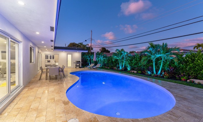 Imperial Point House | Stylish Getaway, Heated Pool, Short Drive to Beach