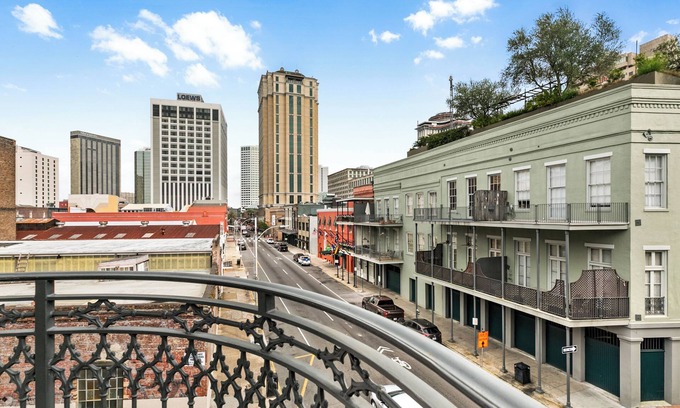 Central Business District Condo | 🖤⚜️STYLISH + HISTORIC Downtown Corner Condo Enjoy City views from your wrap around Balcony!
