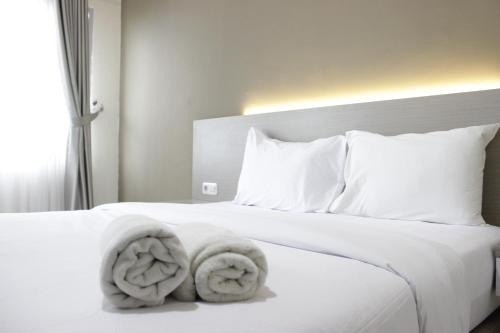 Cileunyi Apartment | Stylish Studio Apartment at Harvard Jatinangor near ITB By Travelio