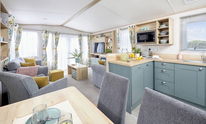 Truro House | Stylish with a touch of luxury 12ft-wide caravan with one double and two twins.