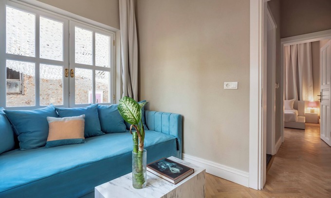 Kaleici House | Suit room with living room and balcony