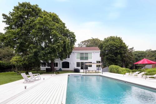 East Hampton House | Summerwood by Rove Travel Home with Pool & Hot Tub