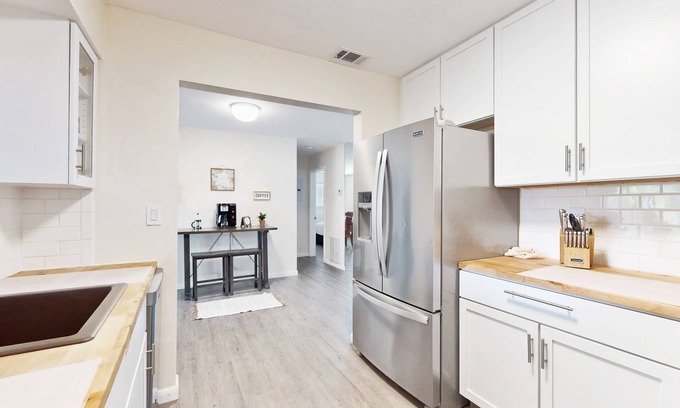 Driftwood House | Sunny abode in an ideal location with yard, grill, alfresco dining, open layout